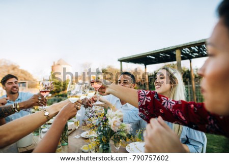 Similar – Freunde essen Kuchen und haben Spaß auf der Party.