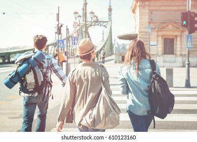 A Group Of Friends, Traveling In The City