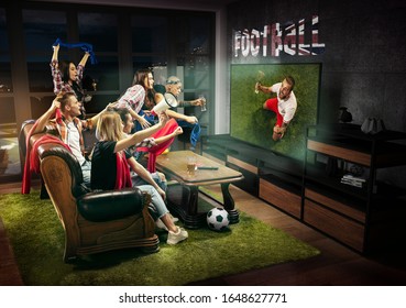 Group of friends watching TV, match, championship, sport games. Emotional men and women cheering for favourite soccer team on Great Britain with flag. Concept of friendship, sport, competition - Shutterstock ID 1648627771