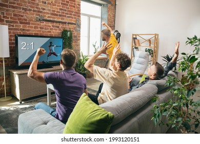 Group Of Friends Watching TV, Sport Match Together. Emotional Fans Cheering For Favourite Team, Watching On Exciting Game. Concept Of Friendship, Leisure Activity, Emotions