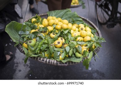 Group Of Fruits (Diospyros Decandra - A Tropical Tree In The Ebony Family) On Bamboo Tray Of Vietnamese Street Vendor