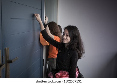 Group Of Girl And Boy Kids Smiling And Dress Up As Halloween Vampire Costume And Knock On Door For Trick Or Treat For Halloween Night Day Theme Coming Soon Together