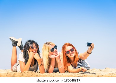 Group Of Girlfriends Taking A Selfie At The Beach - Concept Of Friendship And Fun In The Summer With New Trends And Technology - Best Friends Enjoying The Moment With Modern Smartphone