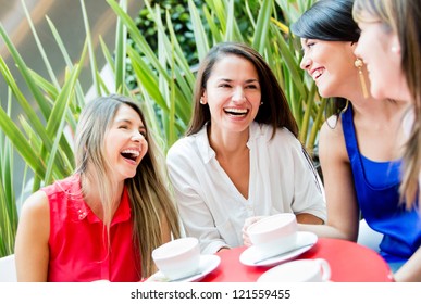 Group Of Girls Having A Coffee And Talking