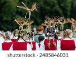 A group of girls in traditional Lithuanian clothes celebrating a festival. High-quality photo.