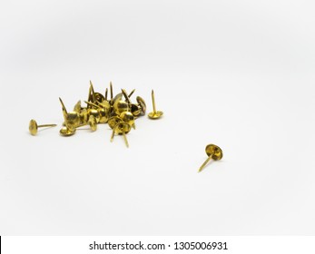 Group Of Gold Metal Thumb Tack On Isolated White Background