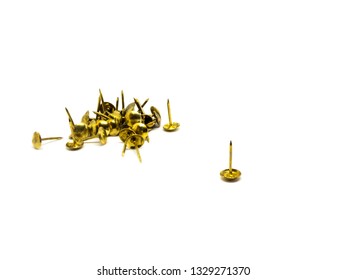 Group Of Gold Metal Thumb Tack On Isolated White Background