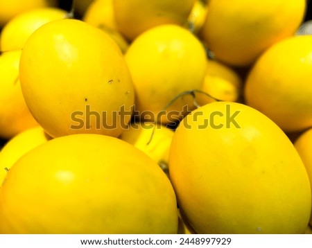 A group of Golden honeydew melon with its bright golden-hued skin.Its flesh is succulent, velvety and sweet.Available in the summer through early fall.Could be used as background.