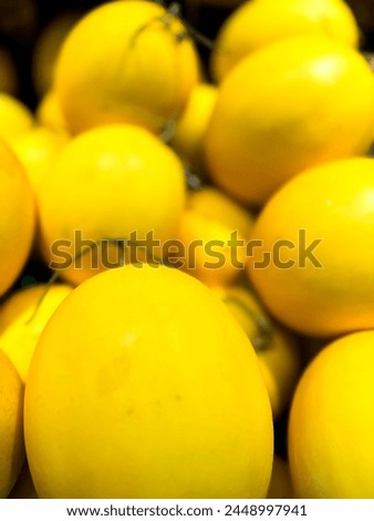A group of Golden honeydew melon with its bright golden-hued skin.Its flesh is succulent, velvety and sweet.Available in the summer through early fall.Could be used as background.