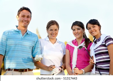 Group Of Golf Players At The Course Smiling