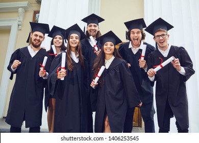 A Group Of Graduates Smiling