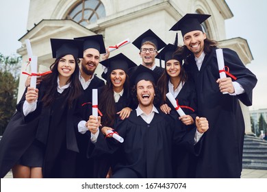 A Group Of Graduates Smiling