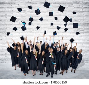 Group of Graduating Students Throwing Caps in The Air