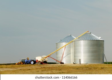 A group of granaries for storing wheat and other cereal grains.  It is located next to a railroad siding for easy loading and unloading.