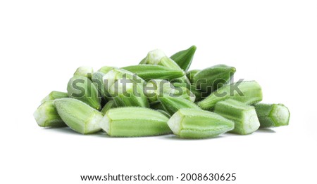 Group of green okra seeds isolated on white background. Fresh raw vegetable