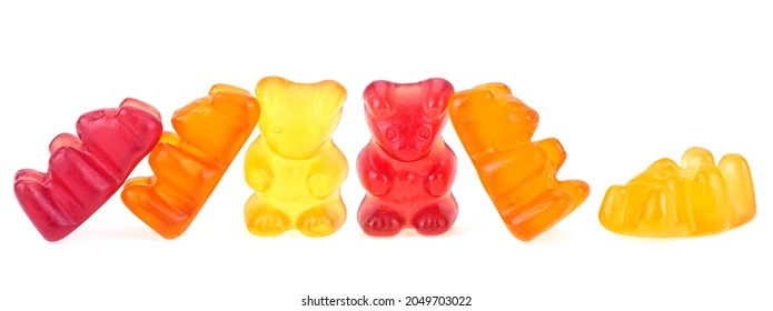 Group of gummy bears isolated on a white background. Colorful jelly bears. Assorted fruit flavored gummy bears.