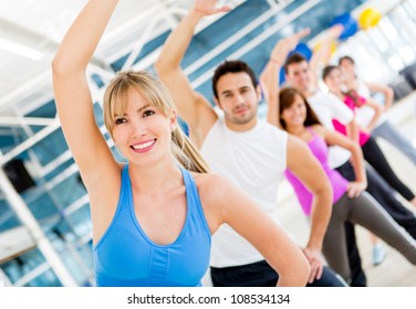 Group Of Gym People In Aerobics Class