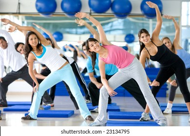 Group Of Gym People In An Aerobics Class