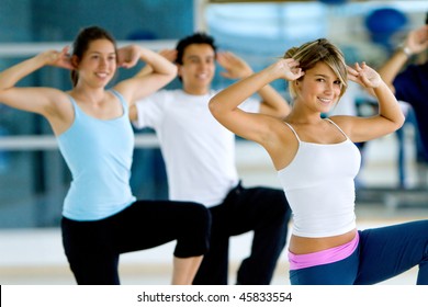 Group Of Gym People In An Aerobics Class