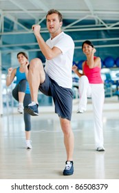 Group Of Gym People In An Aerobics Class