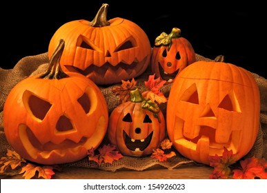 Group of Halloween Jack o Lanterns and decor 