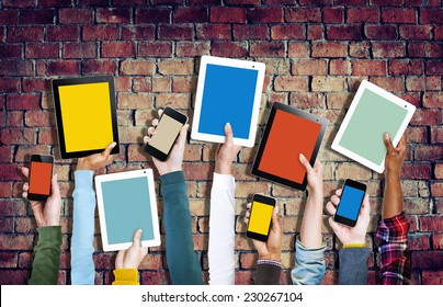 Group Of Hands Holding Digital Devices