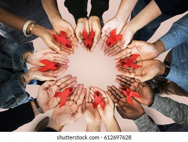 Group Of Hands Holding Red Ribbon Stop Drugs And HIV/AIDS Awareness