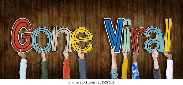 Group of Hands Holding Word Gone Viral