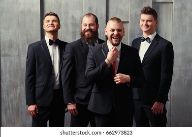 Group Of Handsome Elegant Young Men In Tuxedo.