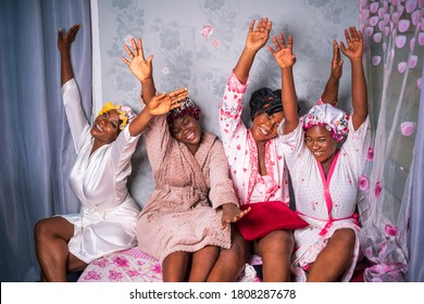 Group Of Happy African Women Wearing Bath Robes With Pink Design Background-concept On Black Breast Cancer Awareness Or Campaign