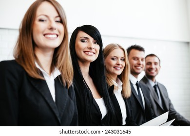 Group Happy Business People Sitting Row Stock Photo 243031645 ...