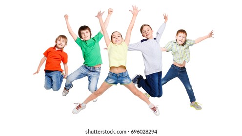 Group of happy, cheerful children jumping at isolated white studio background. Childhood and freedom, active lifestyle concept, copy space - Shutterstock ID 696028294