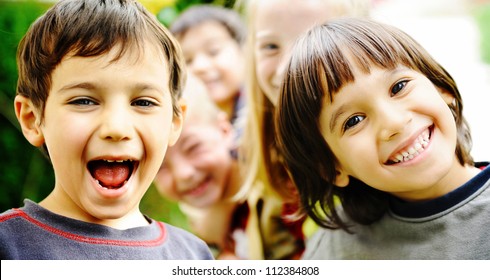 Group of happy children outdoor - Powered by Shutterstock