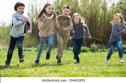 Group Happy Children Running Race Laughing Stock Photo (Edit Now) 554652853