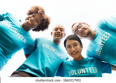 Group of happy and diverse volunteers - Powered by Shutterstock