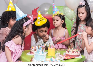 Group of  happy and enjoy kids have fun celebrating her birthday with Multinational friend kids birthday celebratiion party. - Shutterstock ID 2253980681