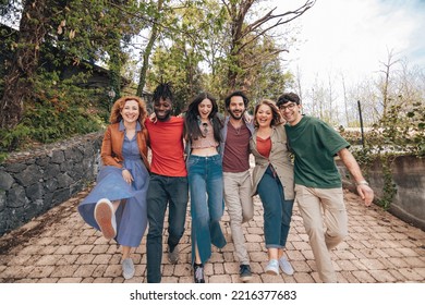 group of happy expats students abroad walking having fun