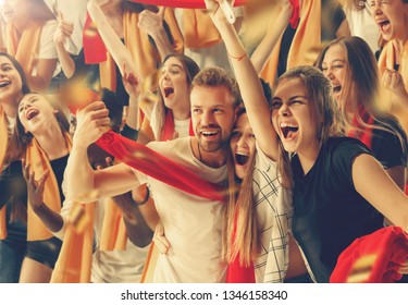 Group of happy fans are cheering for their team victory. Collage made of 8 models. - Shutterstock ID 1346158340