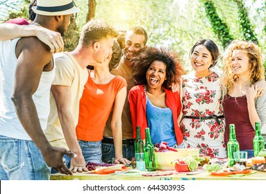 Group Of Happy Friends Having Fun At Barbecue Party Outdoor In House Backyard - Young Diverse Culture People Making Bbq Dinner - Youth, Food And Friendship Concept - Focus On Right Guys - Warm Filter 