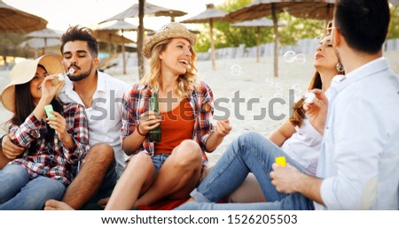 Similar – Image, Stock Photo Group of young people having fun in summer party
