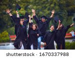group of happy indian students celebrating the college graduation, passing the final university exam