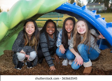 Group Of Happy Kids Playing Outside