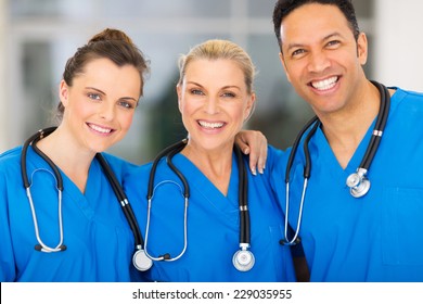 Group Of Happy Medical Team In Hospital