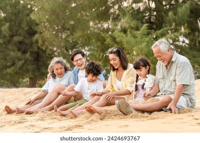 Group of Happy Multi-Generation Asian people family in beach clothing enjoy and fun outdoor lifestyle travel nature at the sea and relaxing together on tropical island beach on summer holiday vacation - Powered by Shutterstock