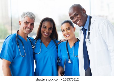 group of happy multiracial medical team in hospital - Powered by Shutterstock