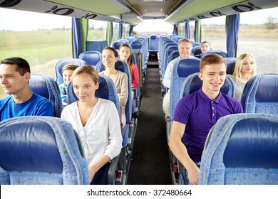 group of happy passengers in travel bus - Shutterstock ID 372480664