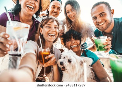 Group of happy people enjoying cocktail party sitting at bar restaurant - Happy friends toasting gin tonic and mojitos together - Food and beverage life style concept - Powered by Shutterstock