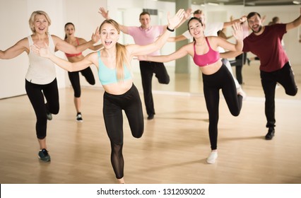 Group Of Happy People Enjoying Dance In Fitness Studio