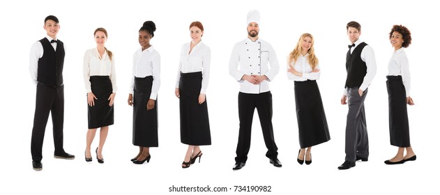 Group Of Happy Restaurant Staffs In A Line Over White Background