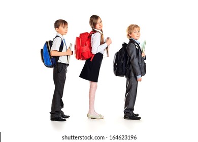 Group of happy schoolchildren standing together. Education. Isolated over white background. - Powered by Shutterstock